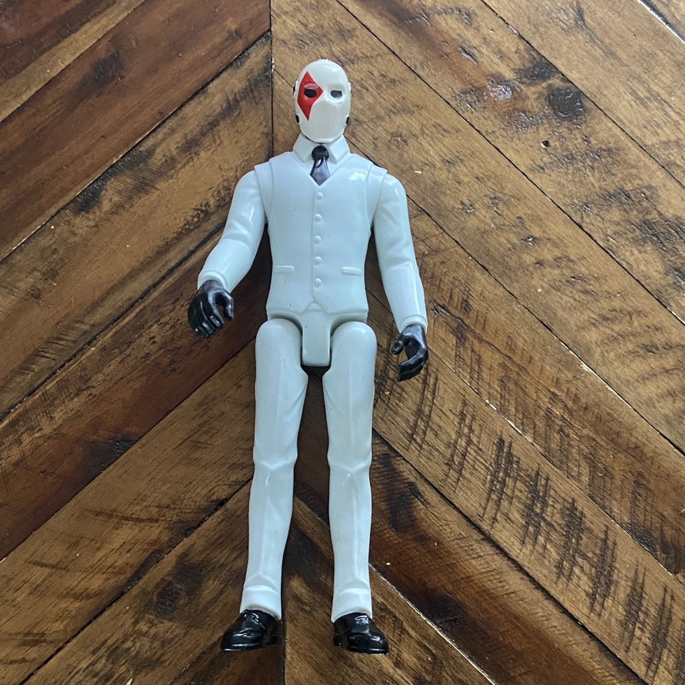 White and Black Masked Action Figure - Suited Villain Toy